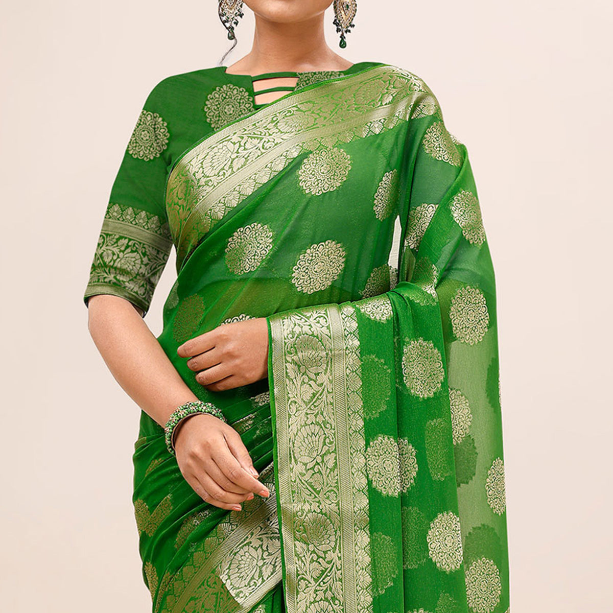 green-woven-chiffon-saree-with-tassels