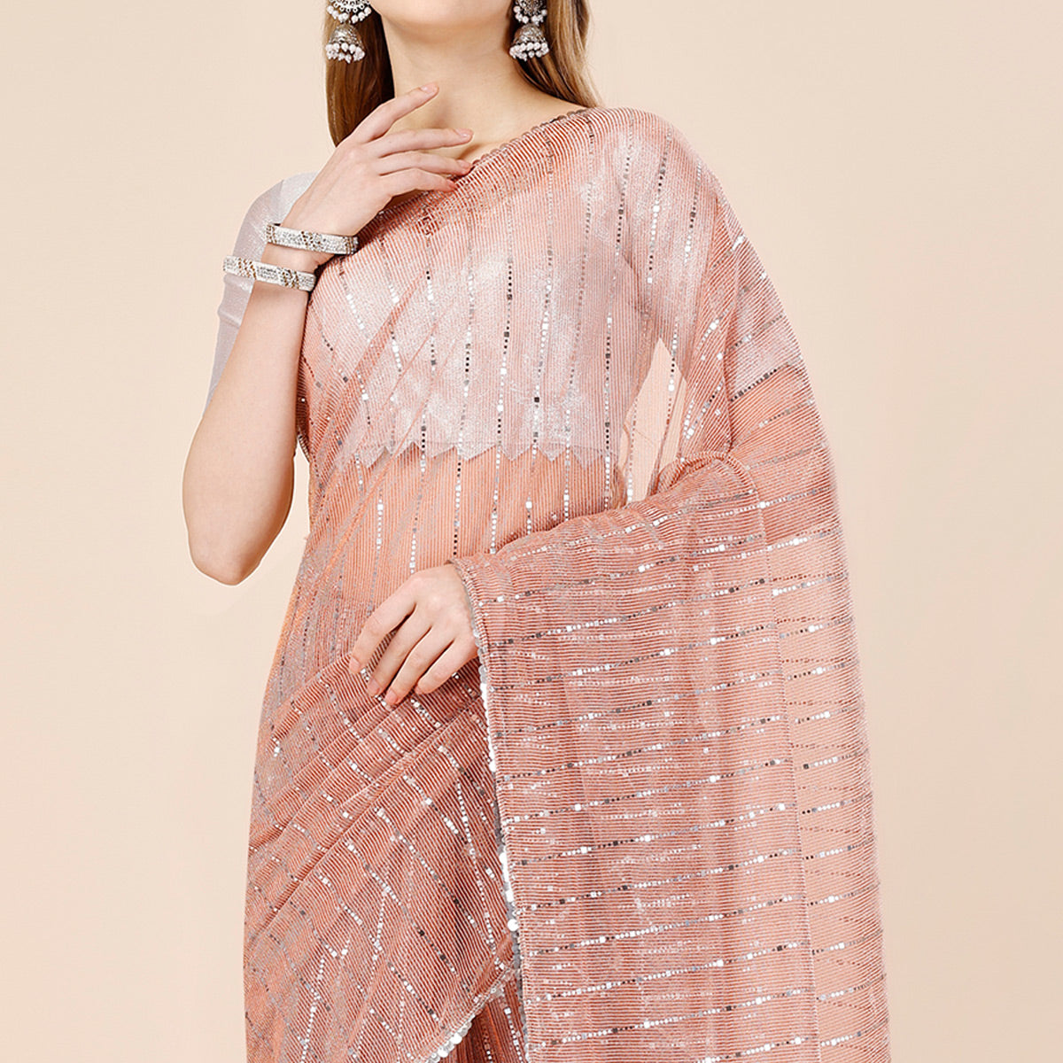 Light Brown Tikki Work Lycra Saree With Embroidered Border