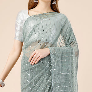 green-tikki-wor-lycra-saree-with-embroidered-border