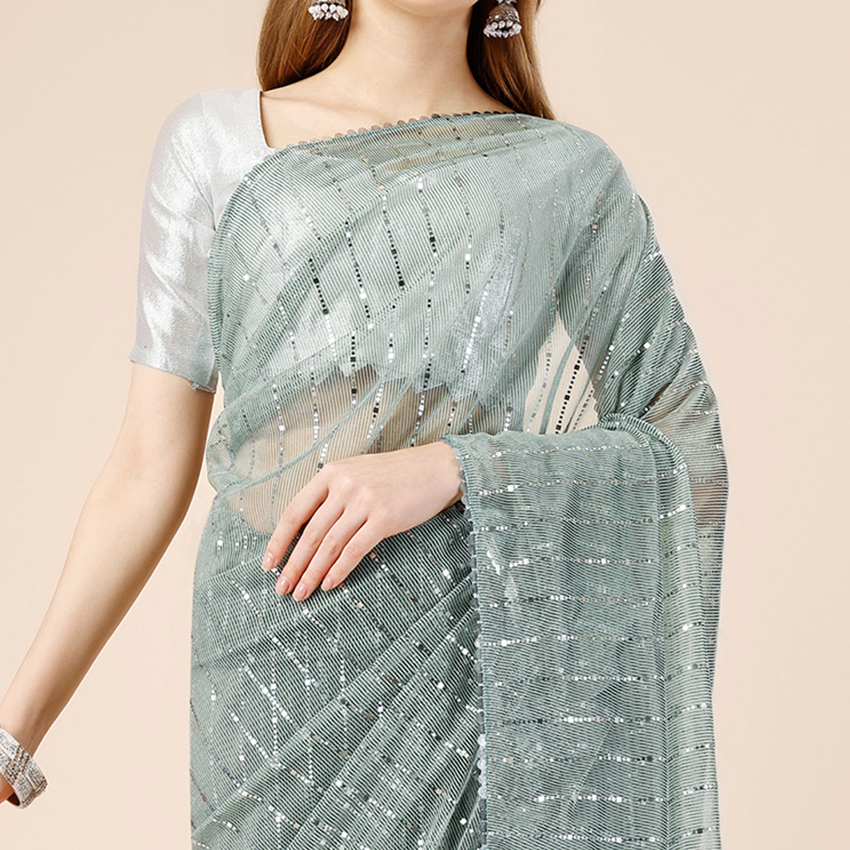 green-tikki-wor-lycra-saree-with-embroidered-border