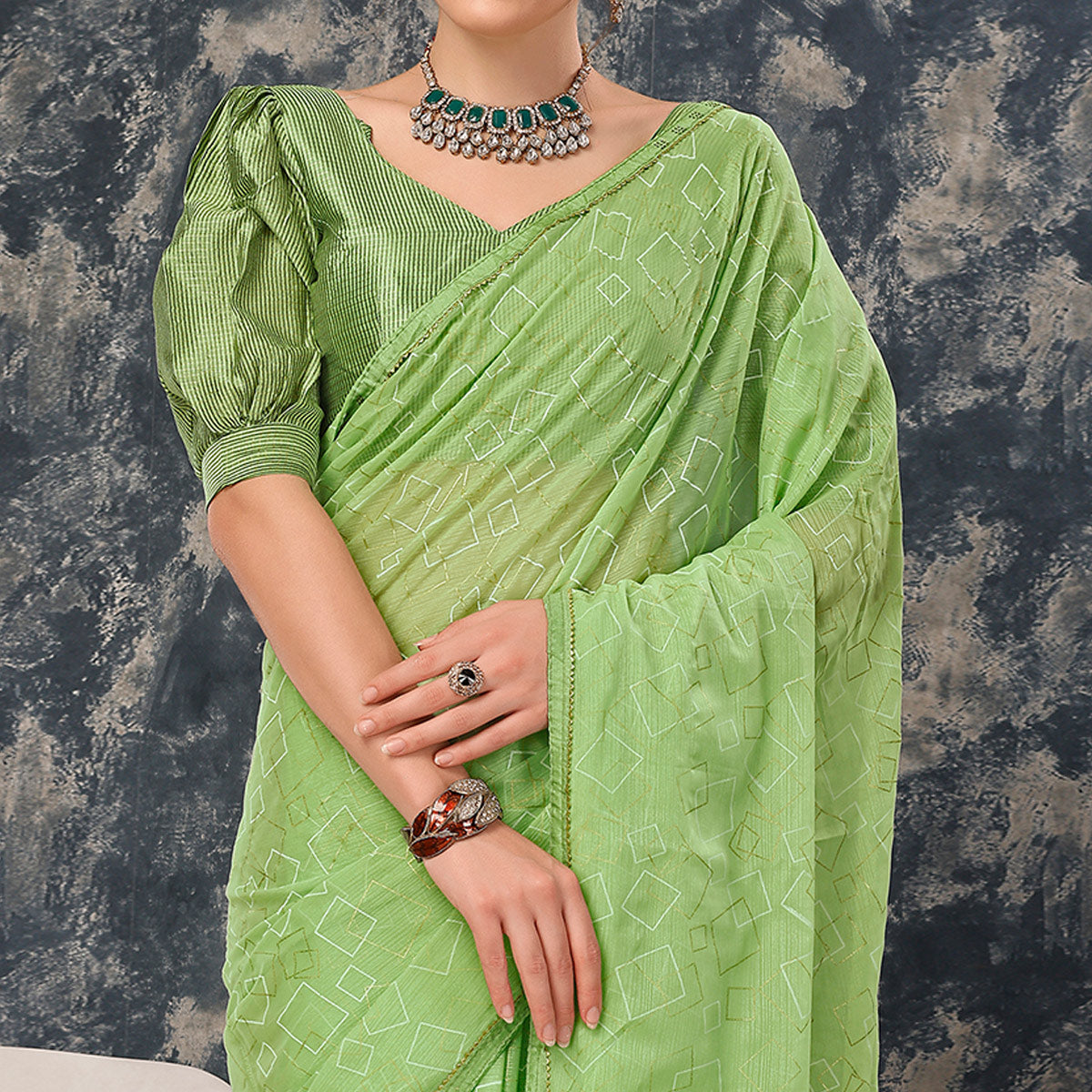 green-printed-with-zari-work-chiffon-saree-with-lace-border