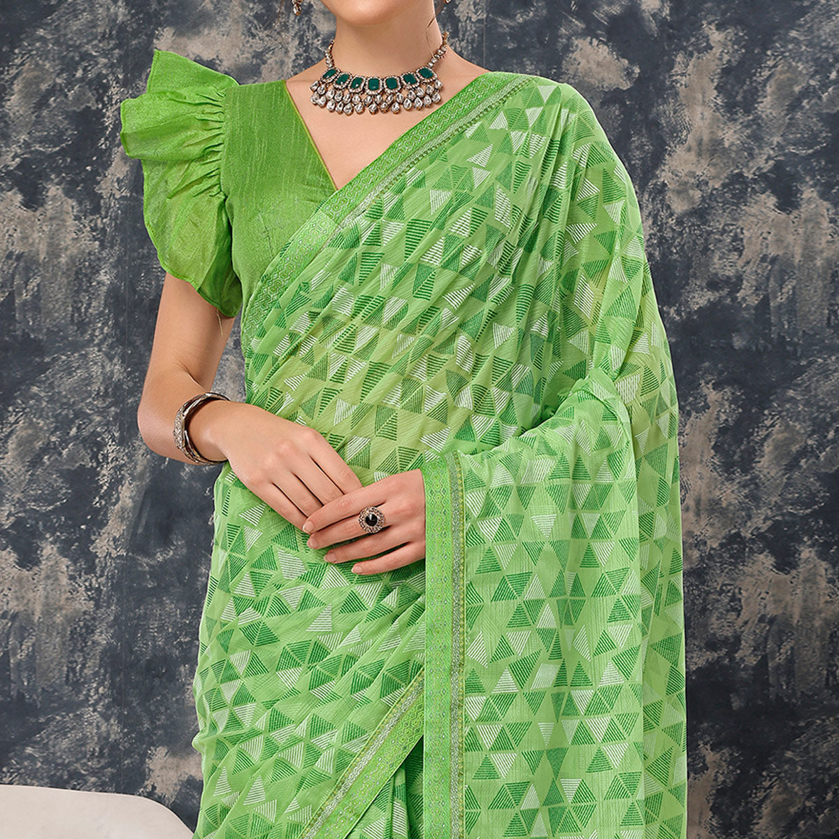 green-geometric-printed-chiffon-saree-with-lace-border