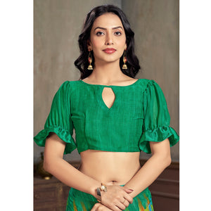 green-printed-chiffon-saree-with-woven-border