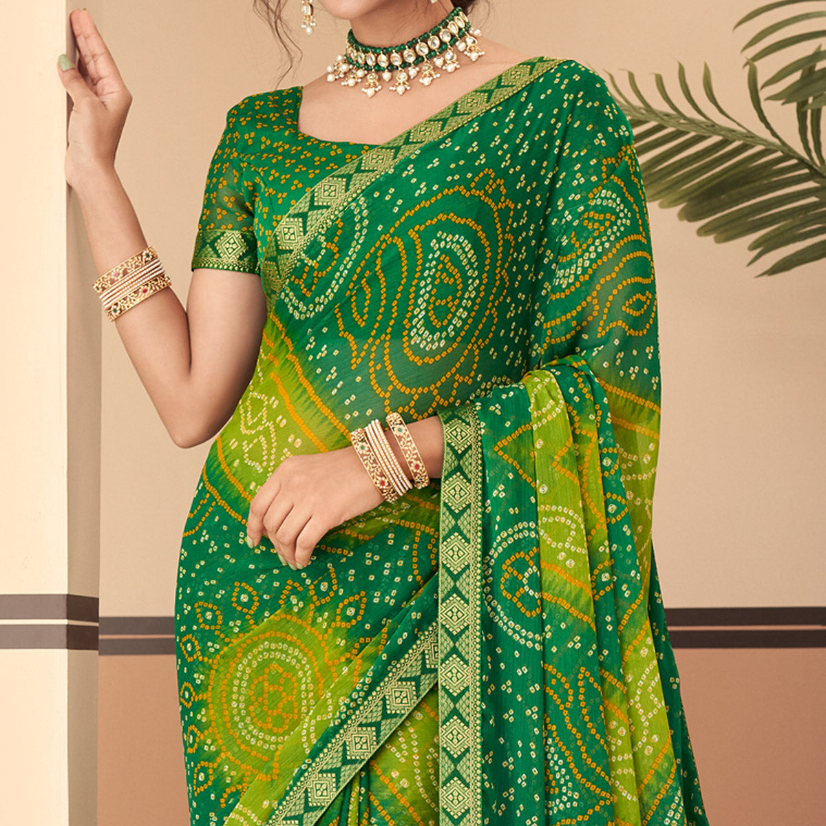 green-bandhani-printed-chiffon-saree-with-lace-border