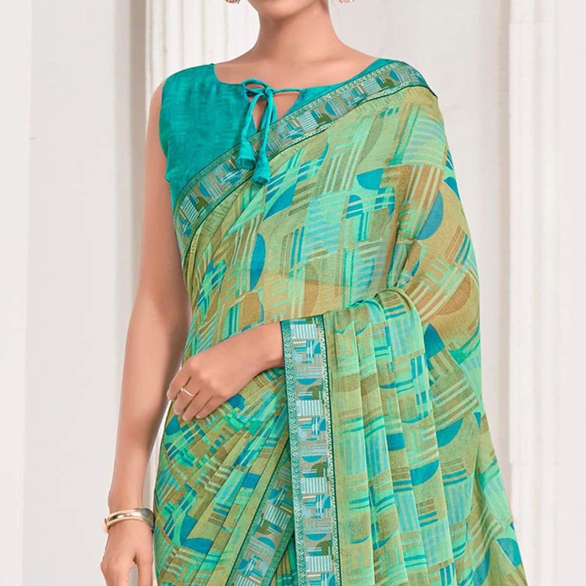 green-geometric-printed-chiffon-saree-with-lace-border-2