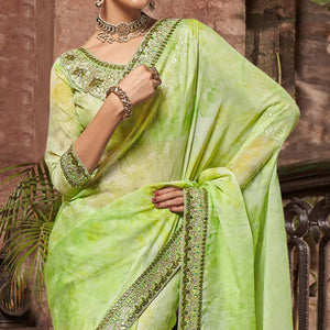 green-abstract-printed-with-embroidered-organza-saree-1