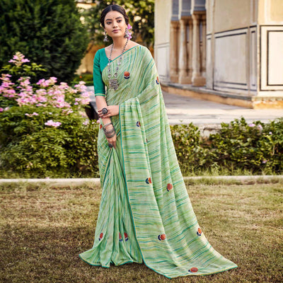 green-printed-raw-silk-saree-with-fancy-border