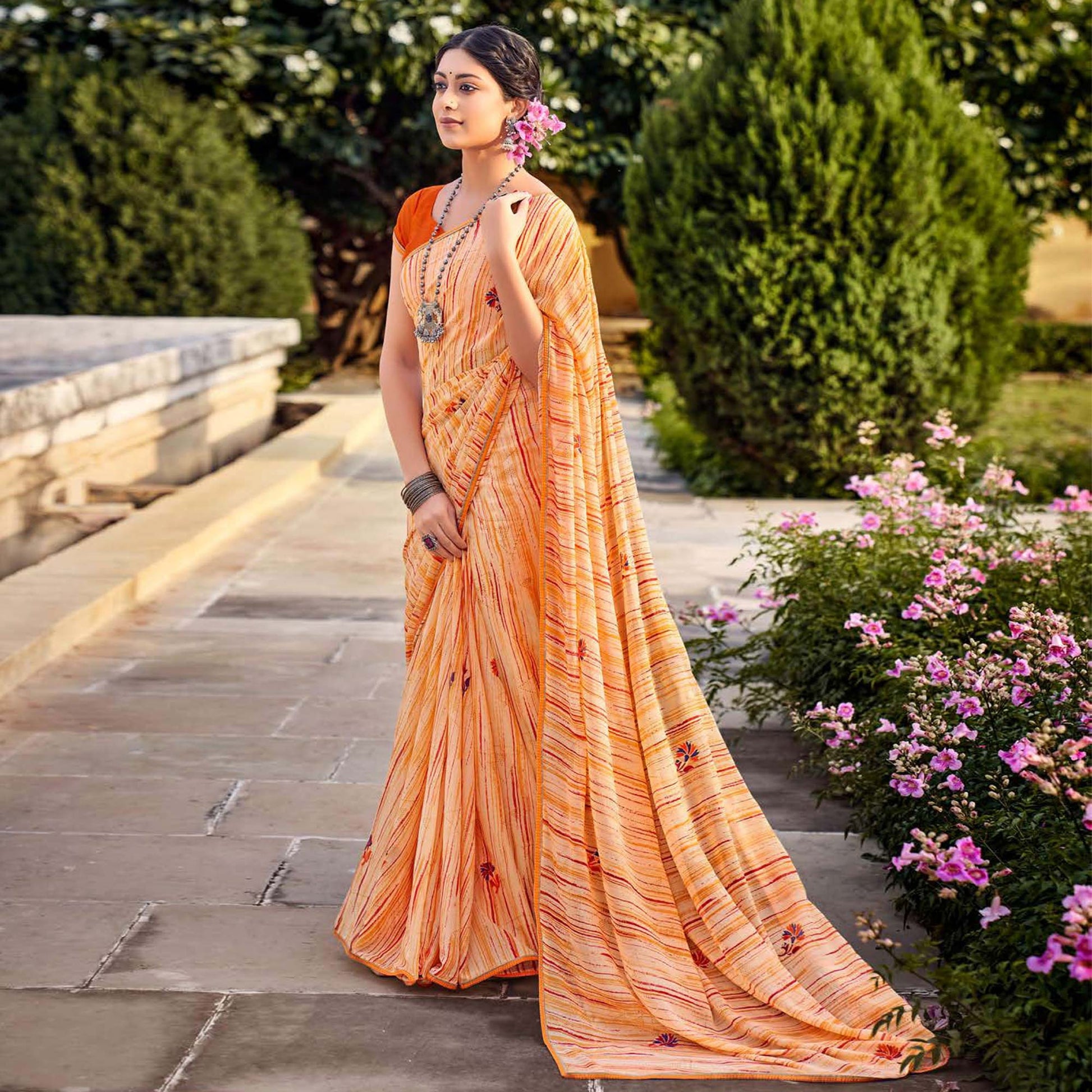 Light Orange Printed Raw Silk Saree With Fancy Border