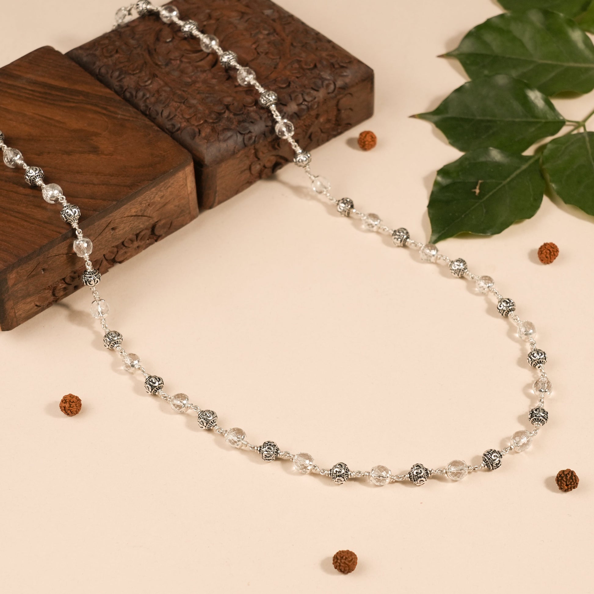 SPHATIK DIAMOND CUT BEADS WITH OM SILVER BEADS MALA