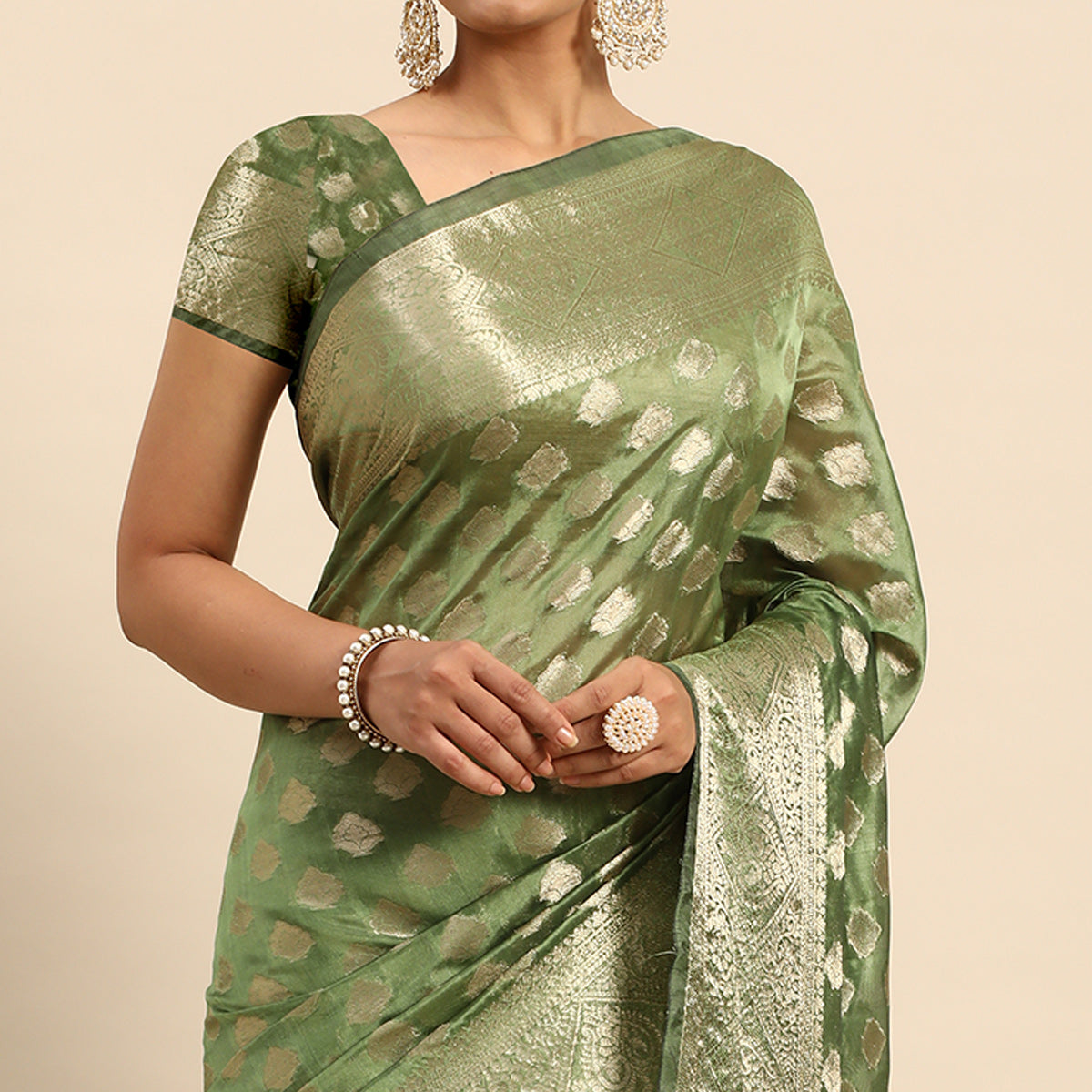 green-woven-organza-silk-saree-with-tassels-1