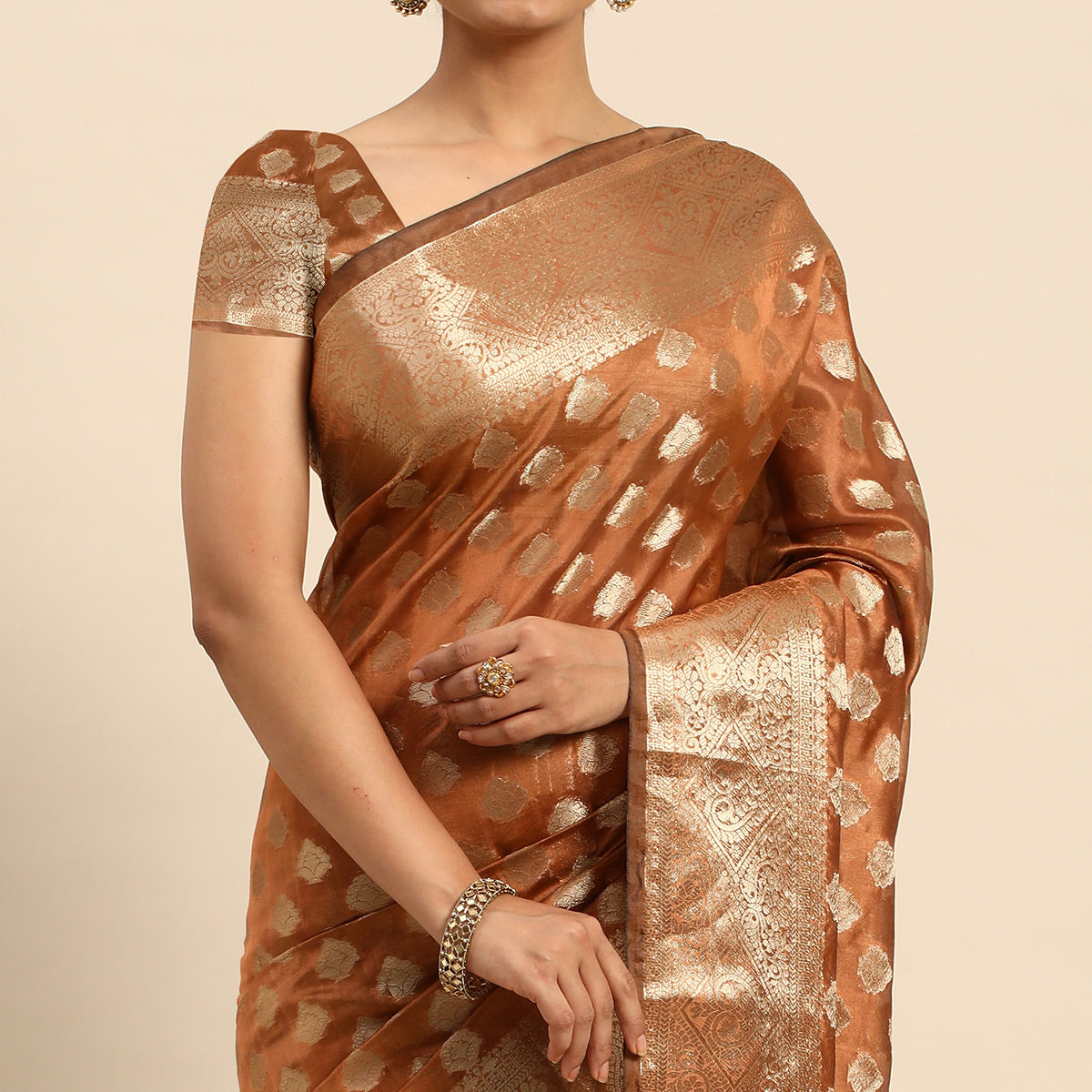 Brown Woven Organza Silk Saree With Tassels