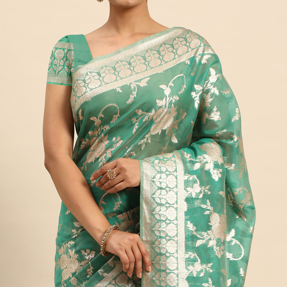green-floral-woven-organza-silk-saree-with-tassels