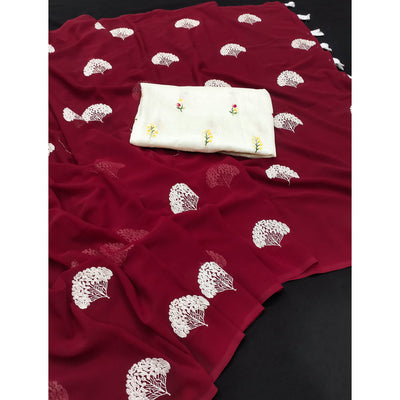 Maroon Thread Embroidered Georgette Saree With Tassels
