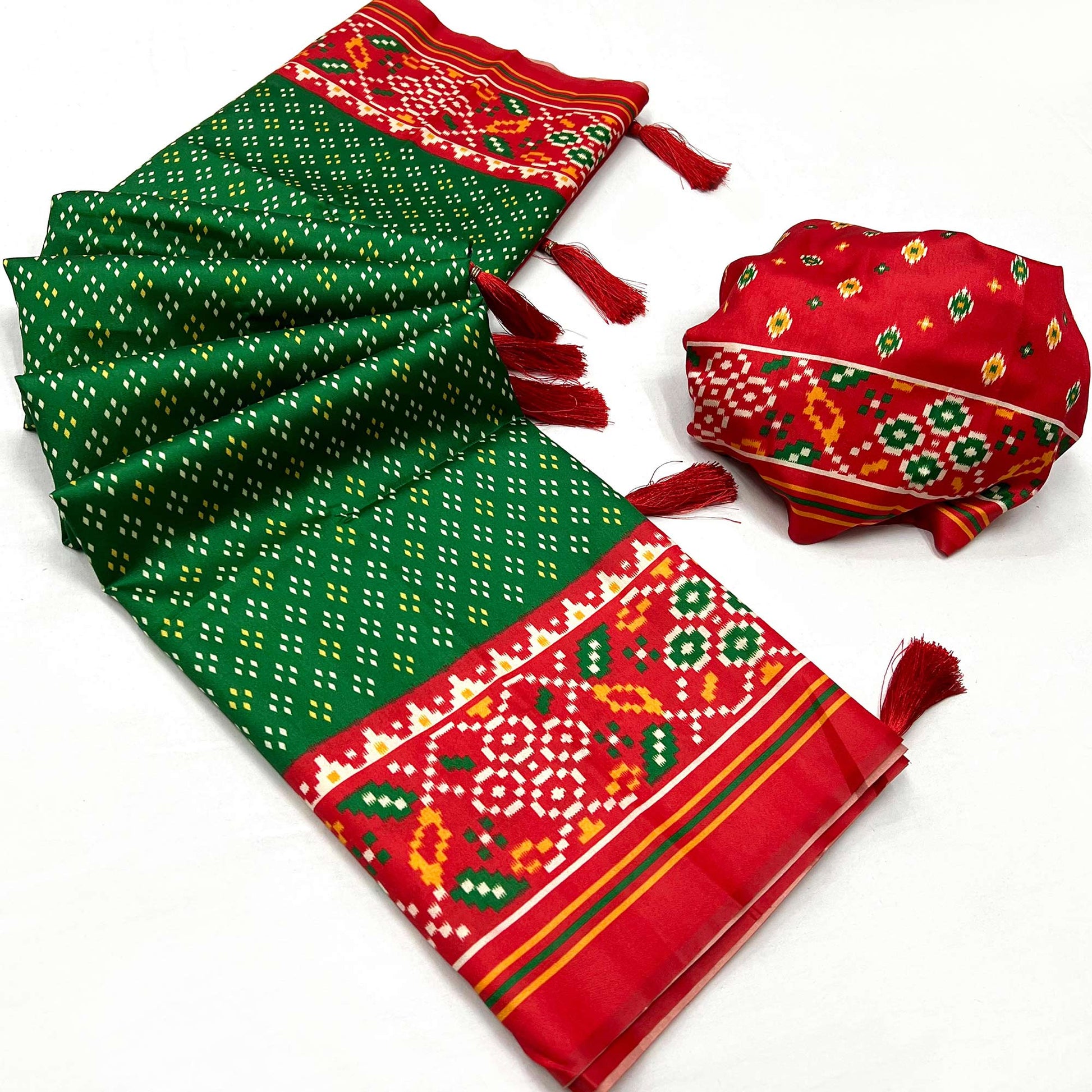 green-patola-printed-tussar-silk-saree-with-tassels