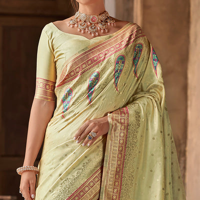Chikoo Floral Woven Banarasi Silk Saree With Tassels