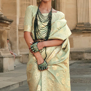 green-floral-woven-art-silk-saree-with-tassels