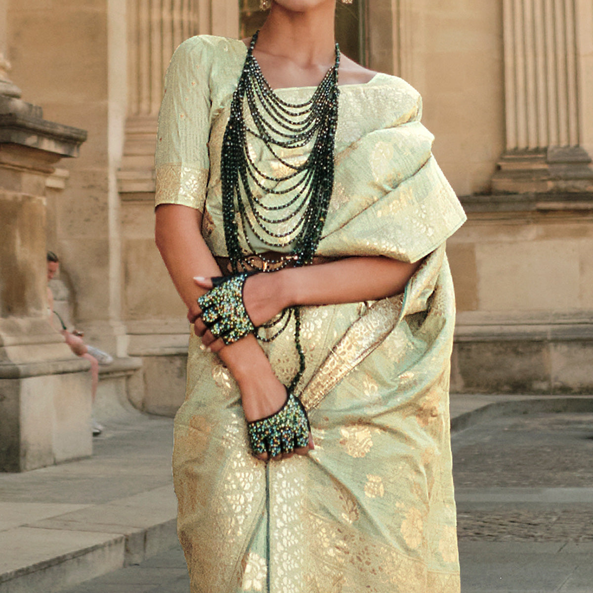 green-floral-woven-art-silk-saree-with-tassels