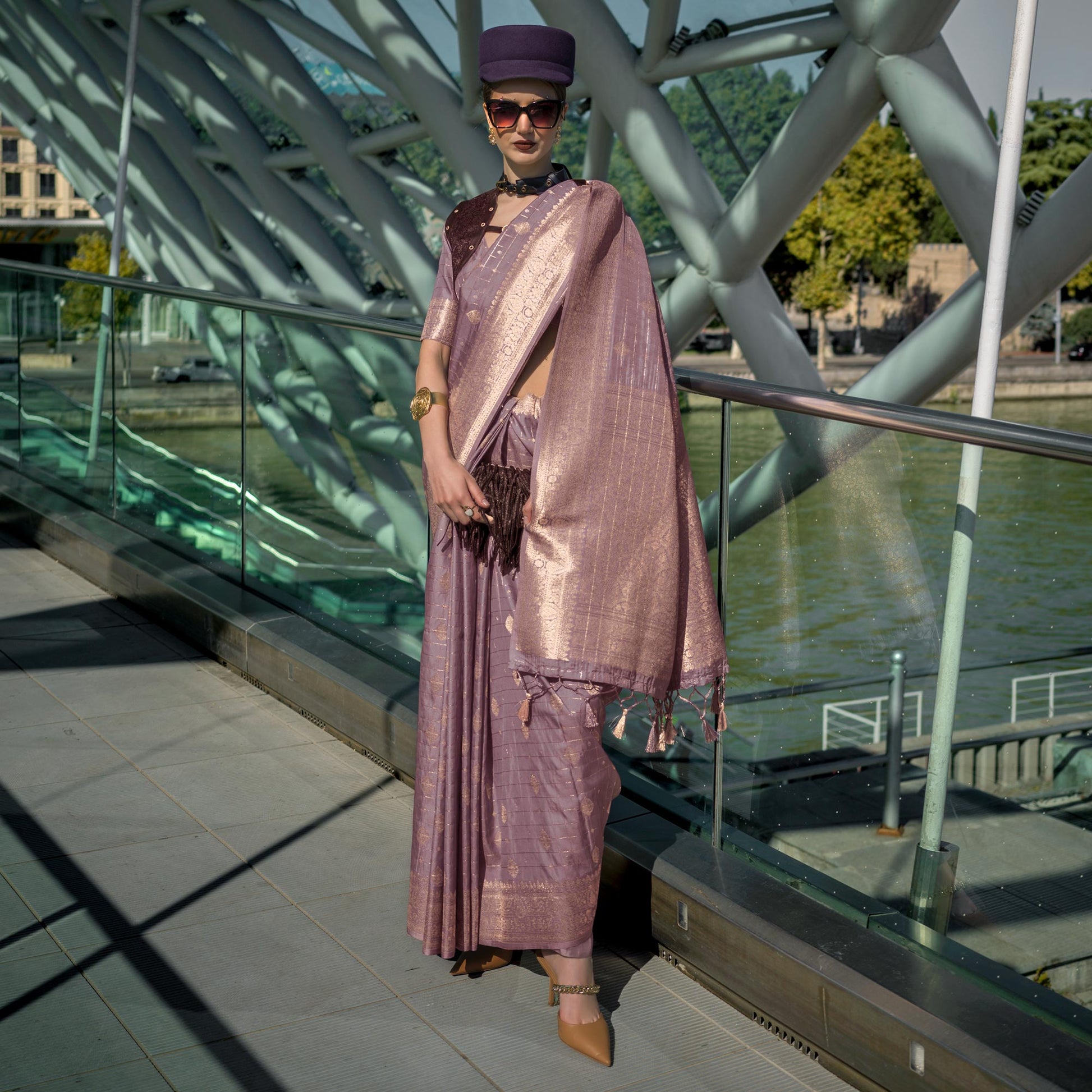 Mauve Woven Art Silk Saree With Tassels