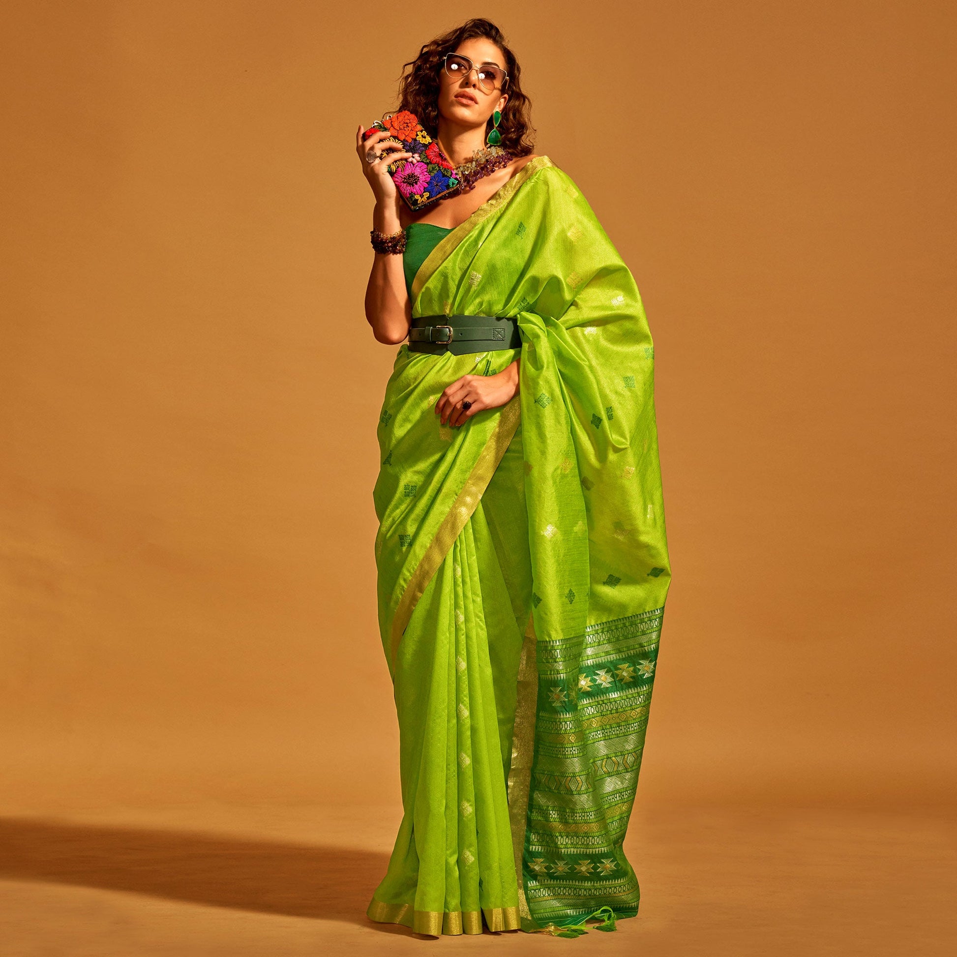 green-woven-art-silk-saree-with-tassels-18