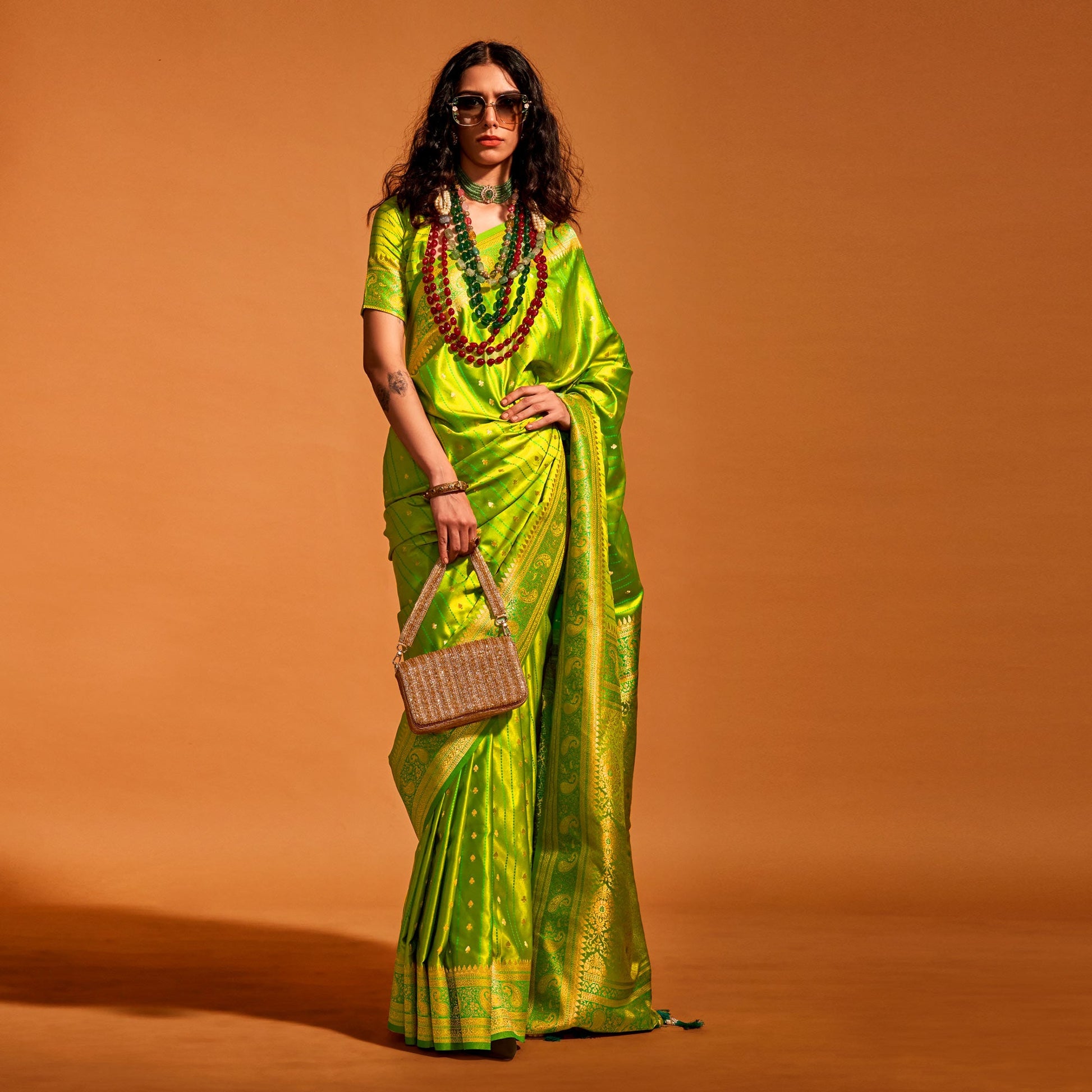 green-woven-zari-border-satin-saree-with-tassels