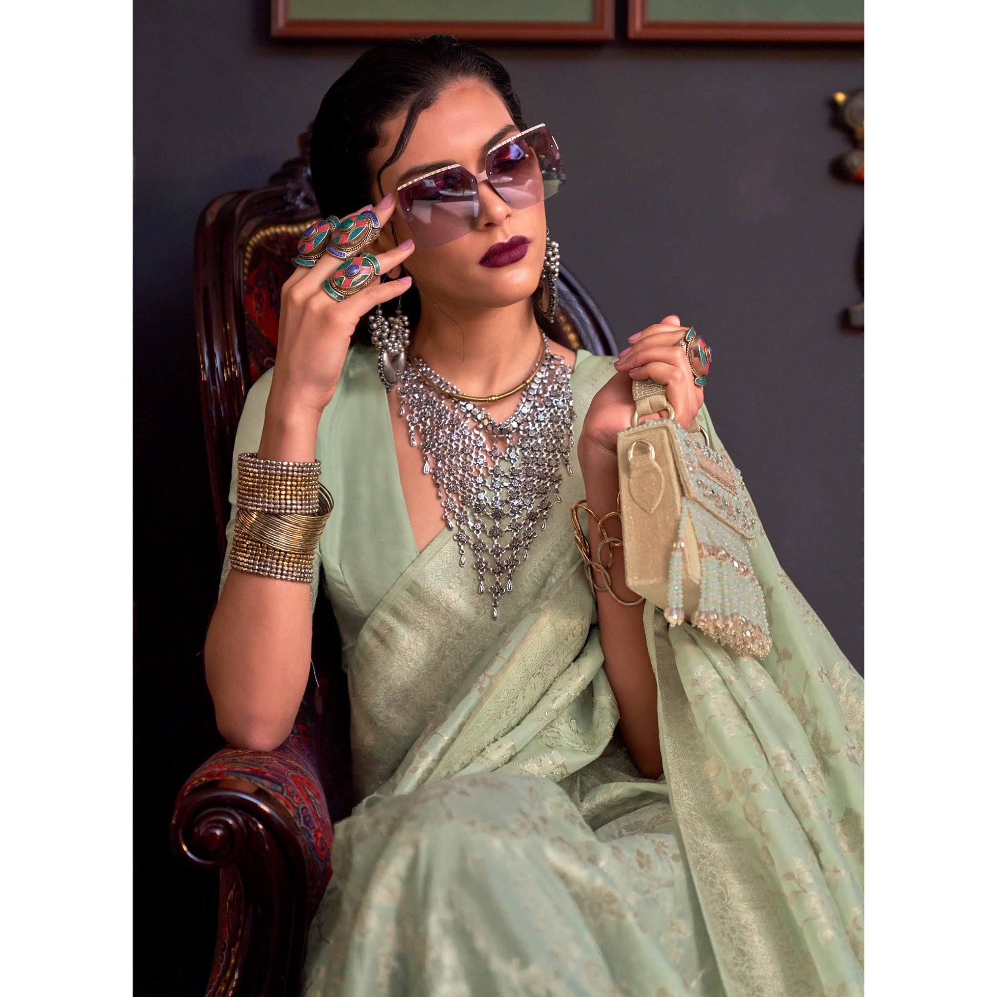 green-woven-art-silk-saree-with-tassels-17