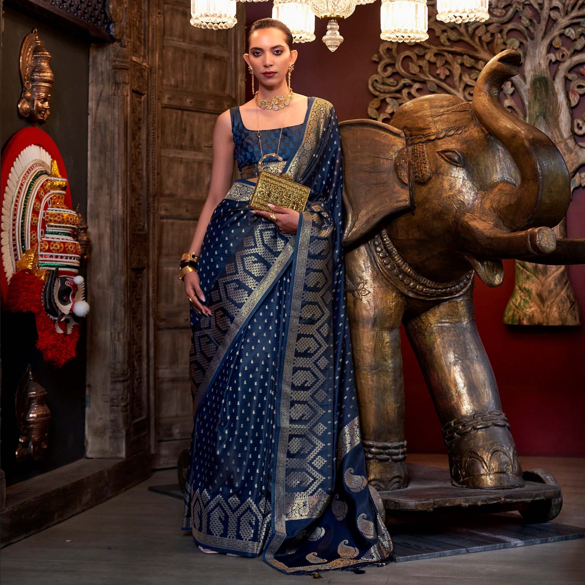 Blue Woven Satin Saree With Tassels