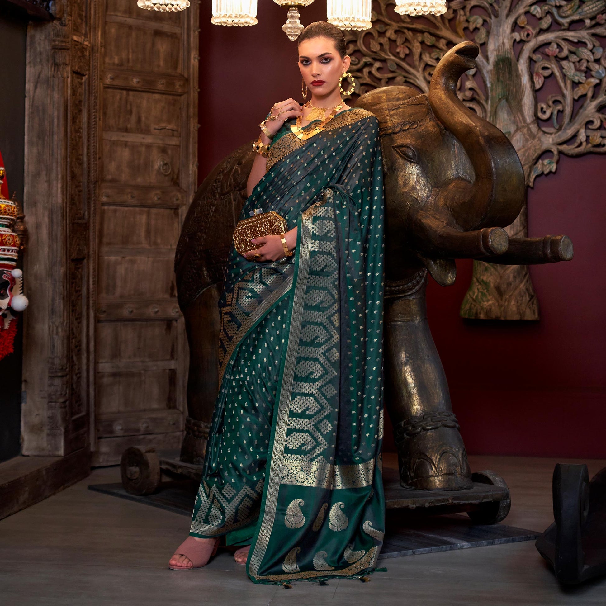 Bottle Green Woven Satin Saree With Tassels