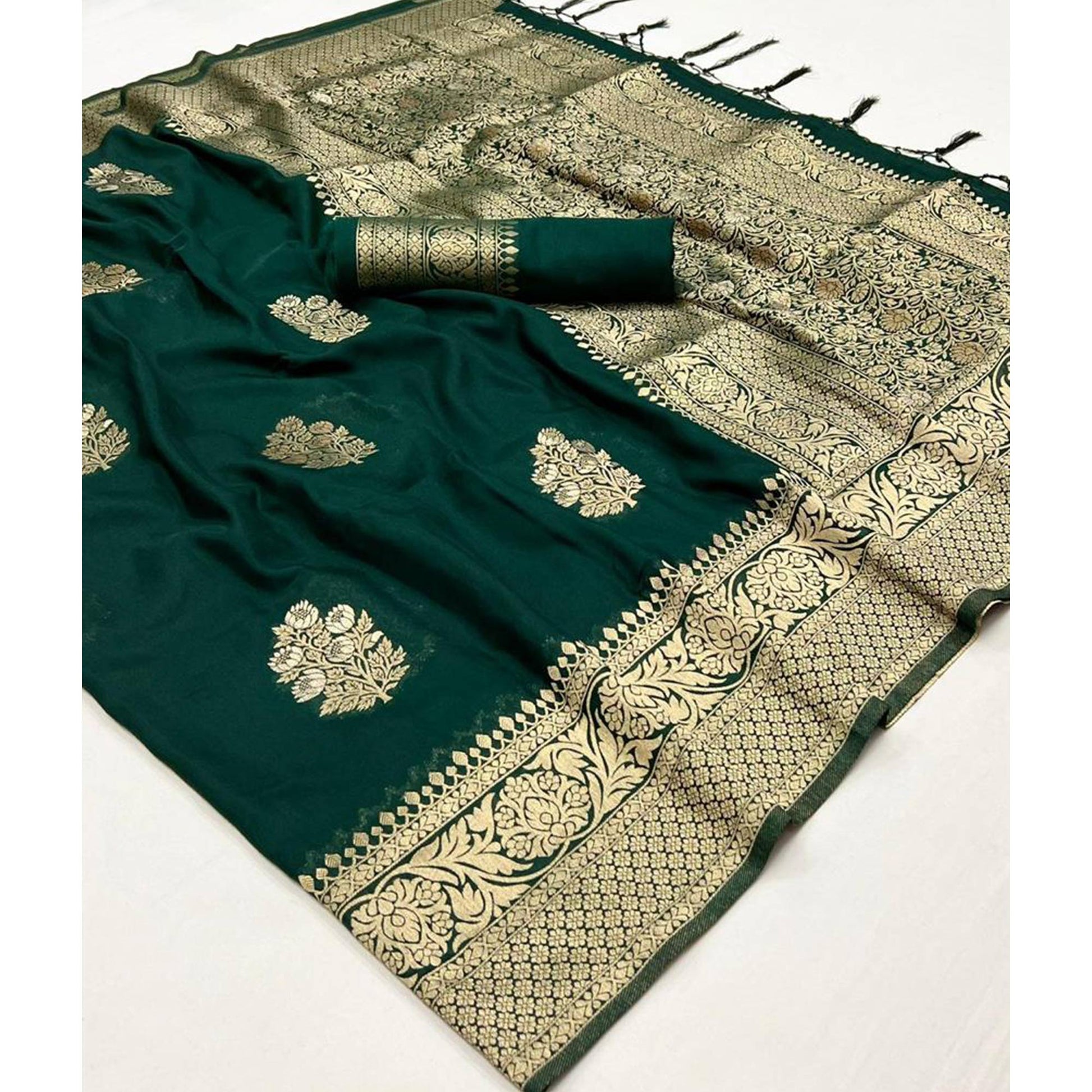 green-woven-georgette-saree-with-tassels