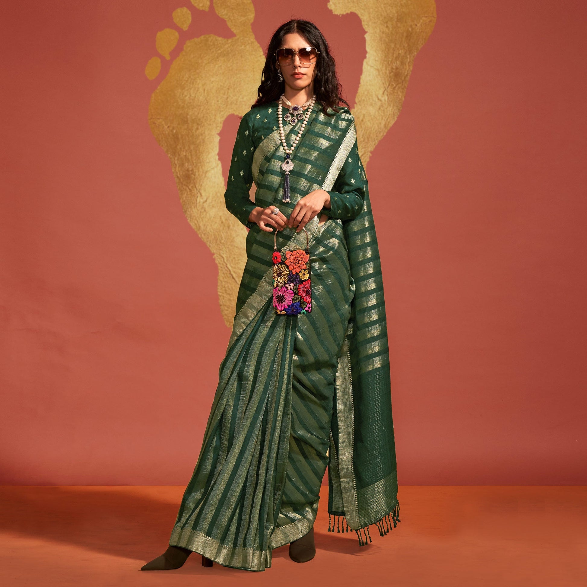green-woven-viscose-saree-with-tassels
