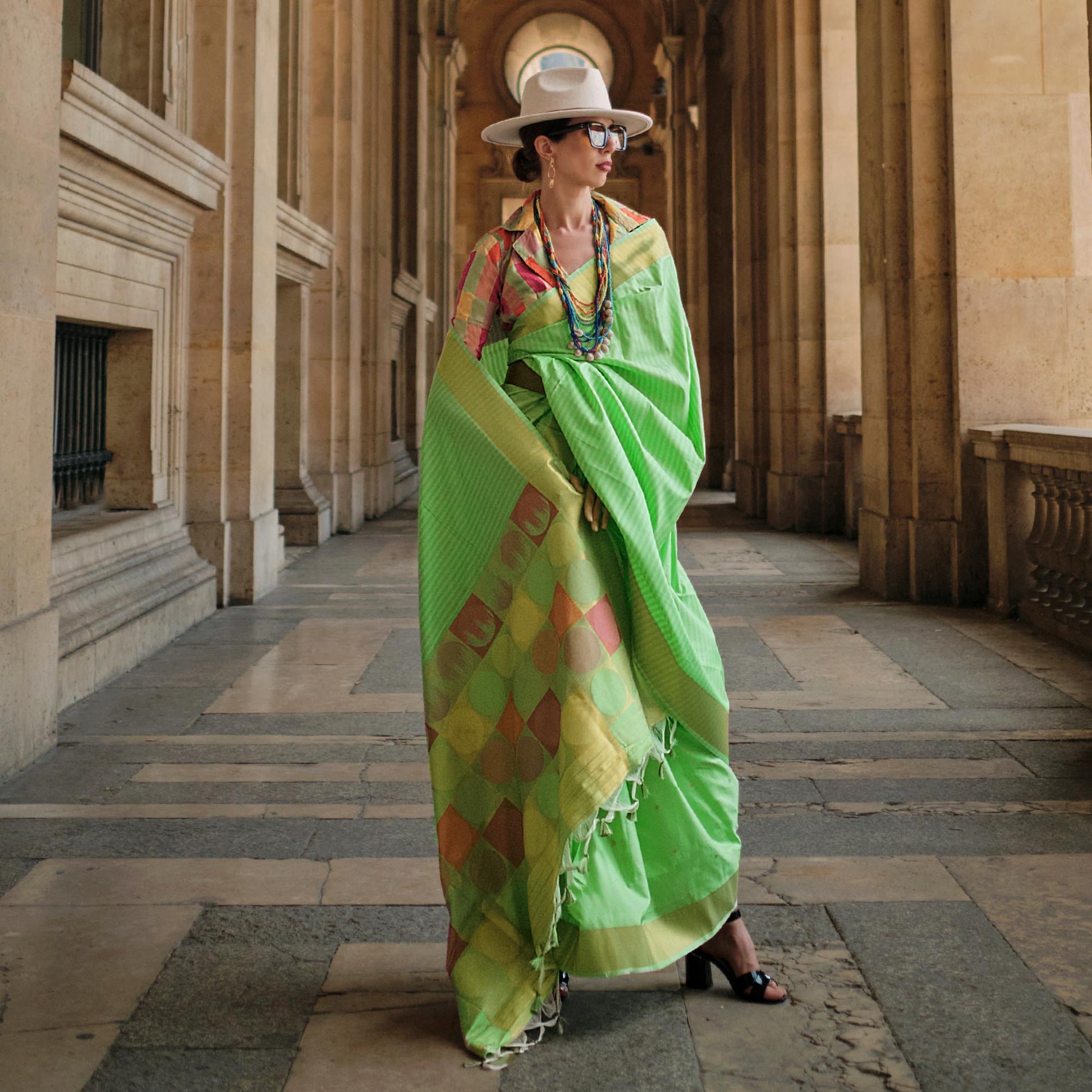 green-floral-woven-art-silk-saree-with-tassels-1