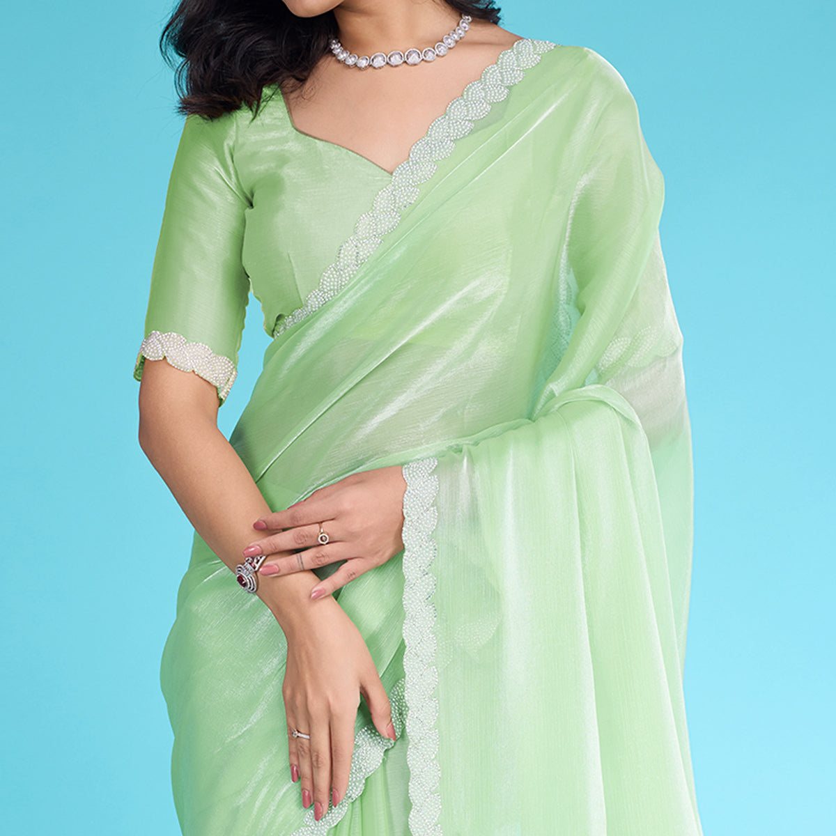 green-solid-with-zarkan-ceramic-pearl-diamond-lace-tissue-saree