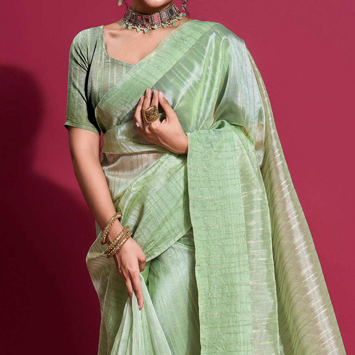 green-woven-organza-zari-saree-withtassels
