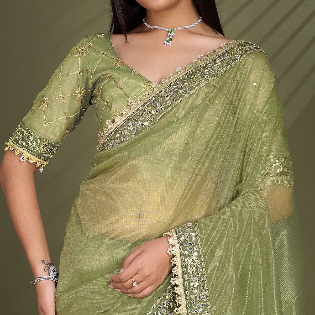 green-sequins-embroidery-with-mirror-handwork-twill-net-saree