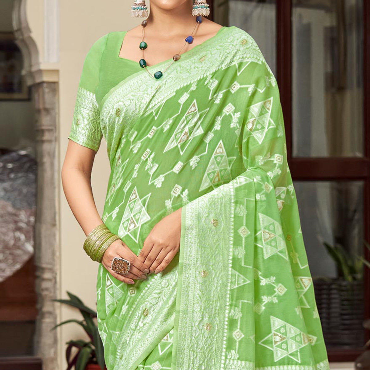 green-woven-cotton-silk-saree-with-tassels-12