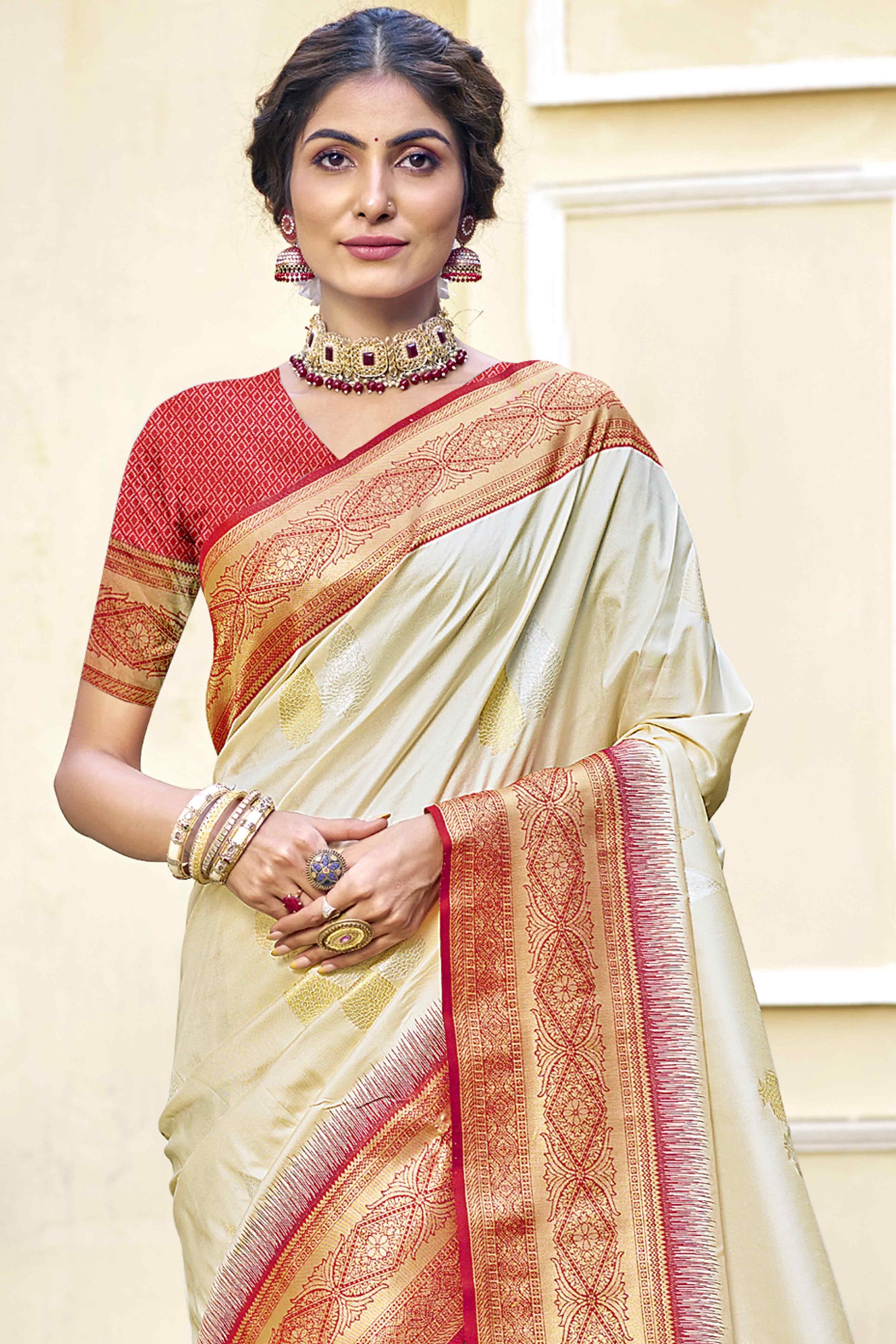 Cream Woven Banarasi Silk Saree With Tassels