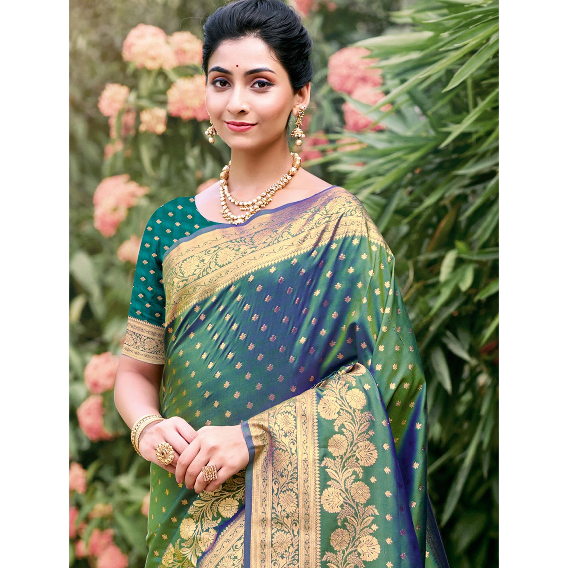 green-floral-woven-banarasi-silk-saree-with-tassels-11