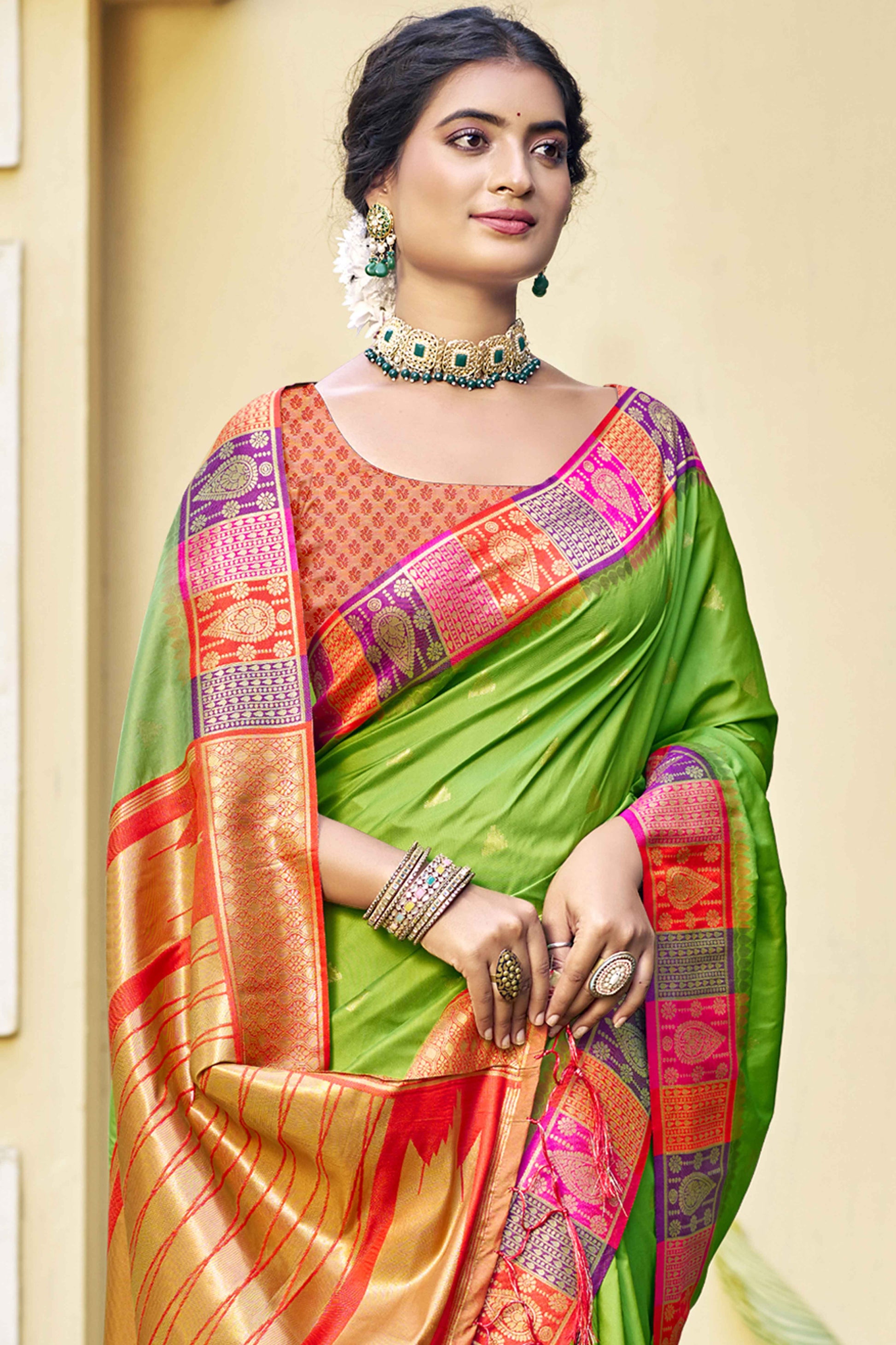 green-woven-banarasi-silk-saree-with-tassels-17