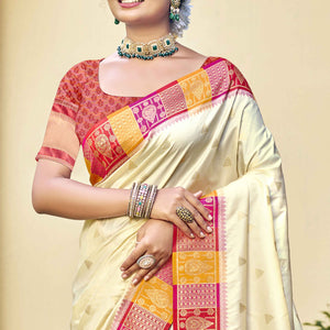 Cream Woven Banarasi Silk Saree With Tassels