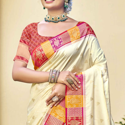 Cream Woven Banarasi Silk Saree With Tassels