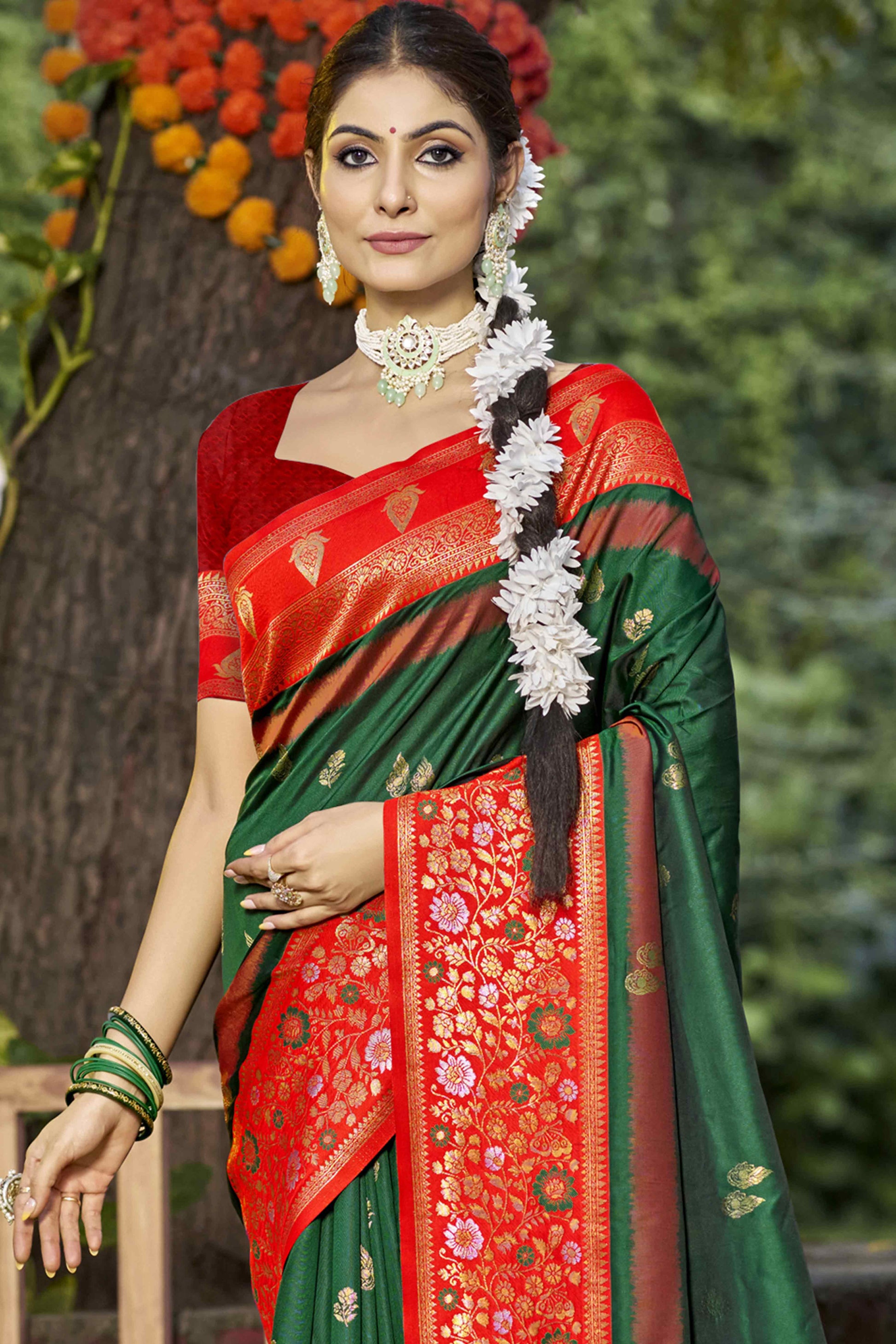 green-floral-woven-banarasi-silk-saree-with-tassels-13