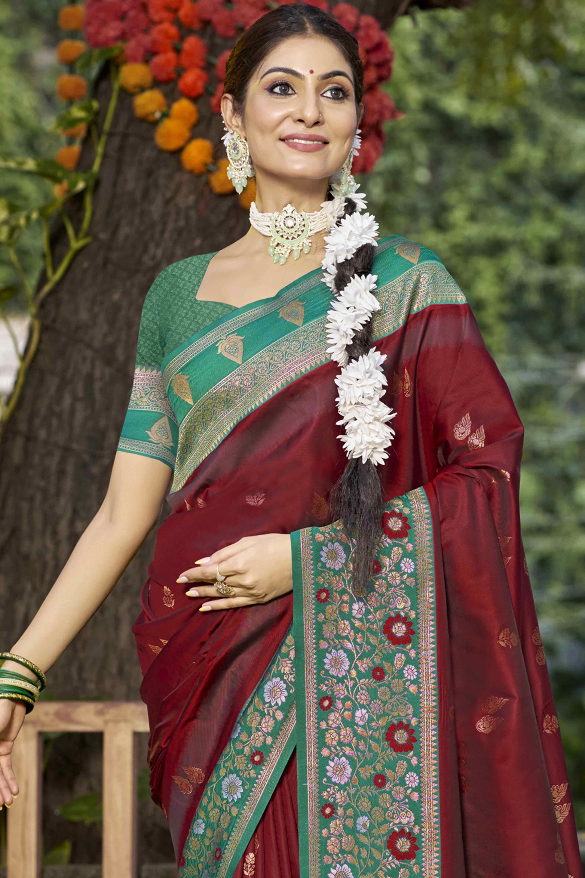 Maroon Floral Woven Banarasi Silk Saree With Tassels