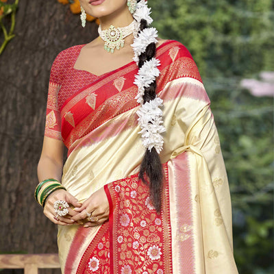 Cream Floral Woven Banarasi Silk Saree With Tassels