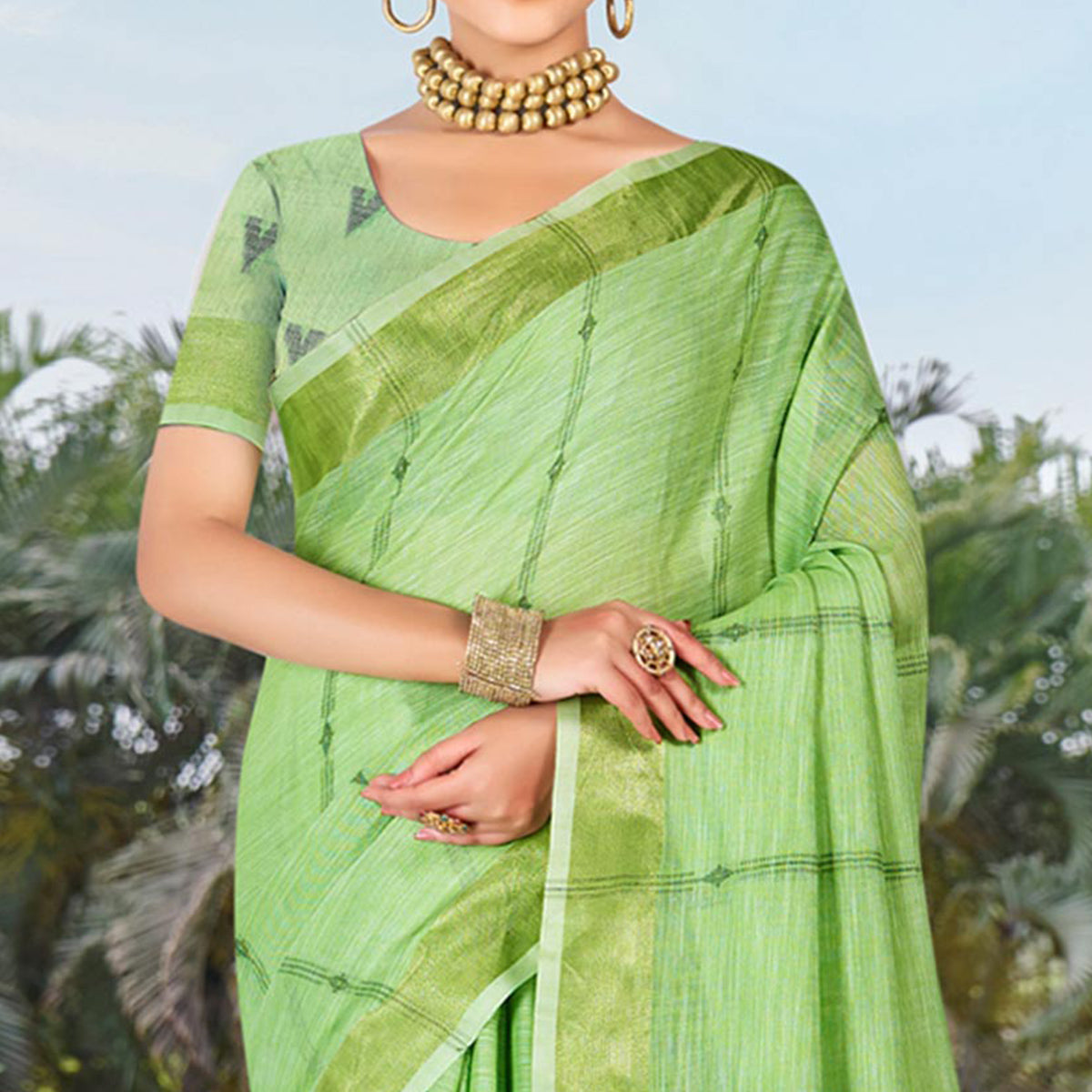 green-woven-cotton-blend-saree-with-tassels-2