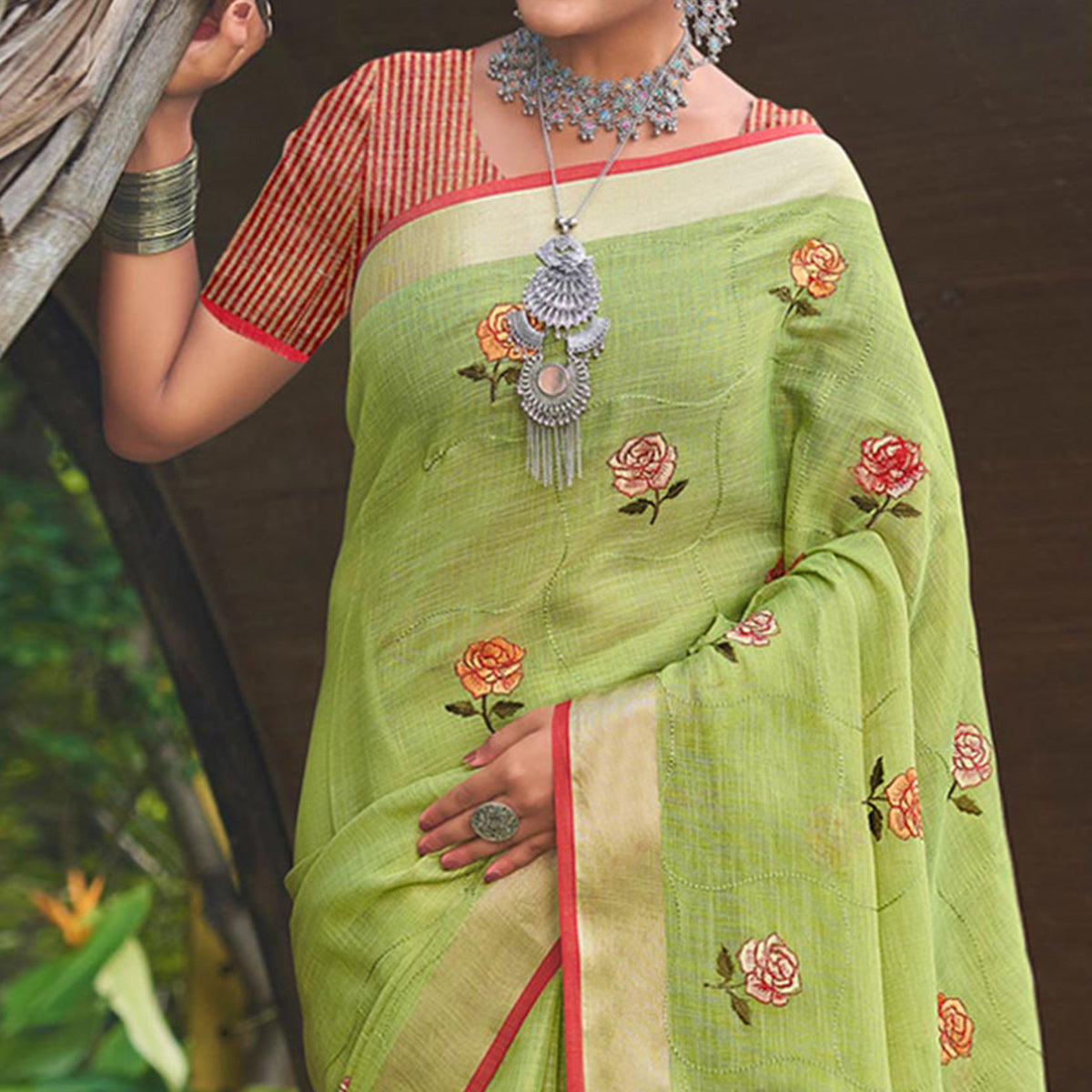 green-floral-embroidered-linen-saree-with-tassels-2