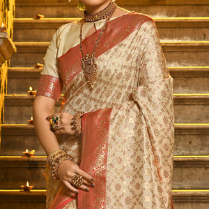 Cream & Peach Floral Woven Banarasi Silk Saree With Tassels
