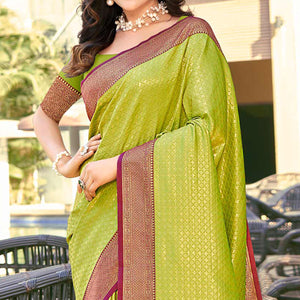 Light Green Woven Banarasi Silk Saree With Tassels
