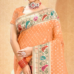 Light Orange Floral Woven Cotton Blend Saree With Tassels