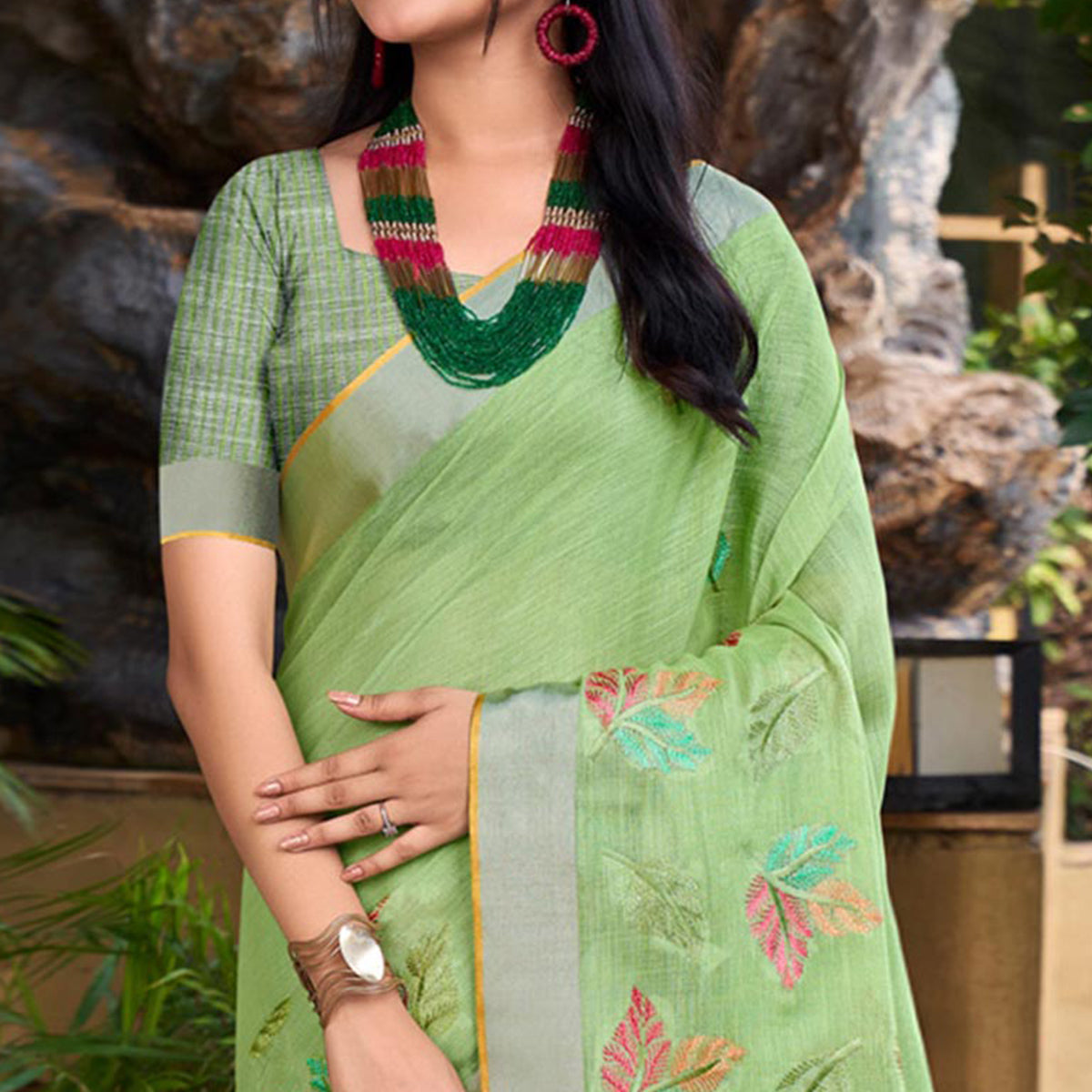 green-floral-embroidered-linen-saree-with-tassels