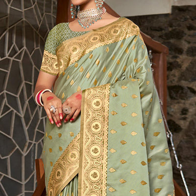 Light Green Woven Satin Silk Saree With Tassels