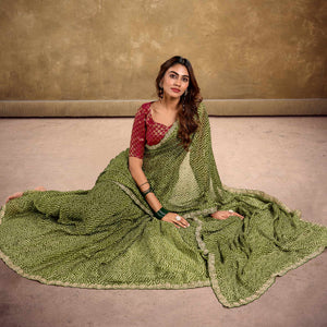 green-printed-chiffon-saree-with-sequins-border-1